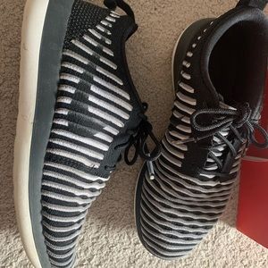 Nike roshe black, grey, and white sneakers